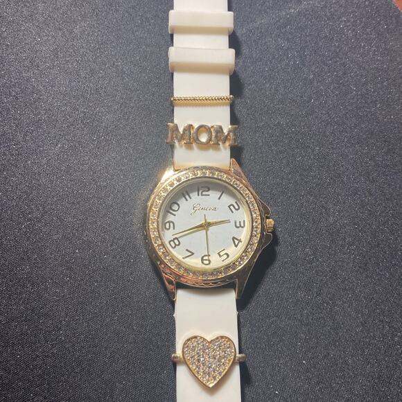 Geneva Mom/Heart Watch Pre-Owned. Gold watch with white band. - Picture 2 of 6